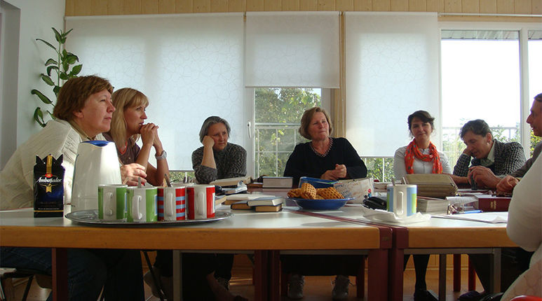 Kursteilnehmer im Saal